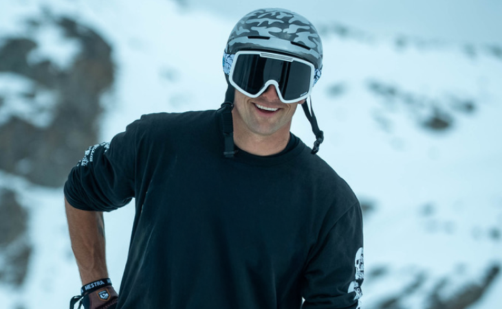Nick Goepper in helmet on snowy slope
